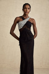 A black floorlength maxi dress with a crossover bodice adorned with crystal embellishments