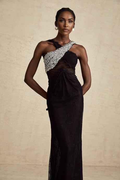 A black floorlength maxi dress with a crossover bodice adorned with crystal embellishments