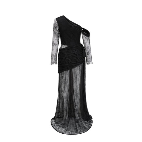 A black floorlength maxi dress with a single shoulder strap and a cutout detail worn by a model against a plain background