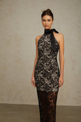 A black floral lace maxi dress with a halter neckline featuring a long flowing skirt and delicate lace pattern throughout