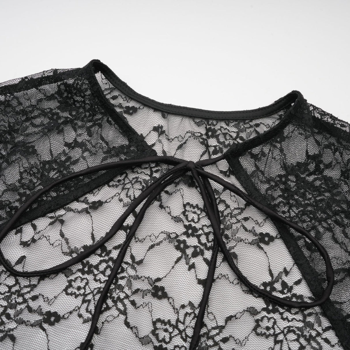 A black floral lace sleeveless vest and matching dress set named Louise