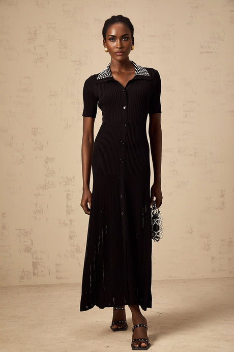 A black knit midi dress with studded embellishments featuring a fitted silhouette and long sleeves named Laetitia