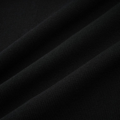 A black knitted mini dress with embellishments and ruffled details named Fabienne
