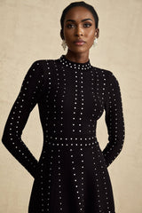 A black knitted mini dress with embellishments and ruffles named Fabienne