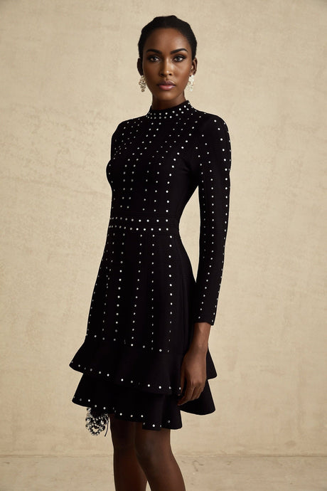 A black knitted mini dress with ruffled details and embellishments named Fabienne