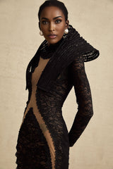 A black long formal dress with a structured bodice and fishtail skirt featuring a thigh high split