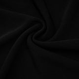A black long maxi dress with a hood featuring floral appliqué details named Axelle
