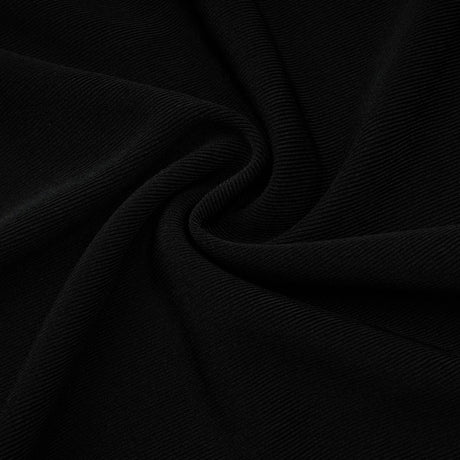 A black long maxi dress with a hood featuring floral appliqué details named Axelle