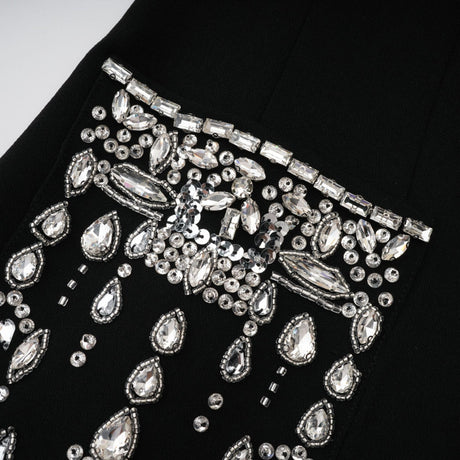 A black maxi blazer dress with embellishments named Diane featuring a long silhouette and formal styling