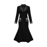 A black maxi blazer dress with embellishments named Diane featuring a long silhouette and formal styling