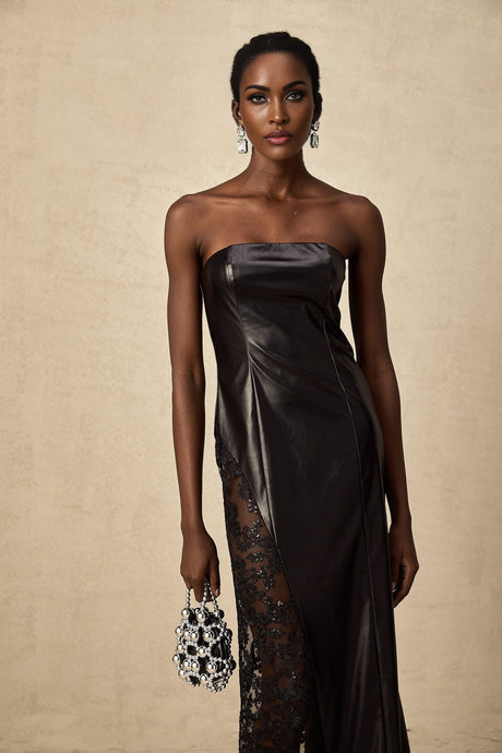 A black maxi dress with a faux leather body and sheer lace panels