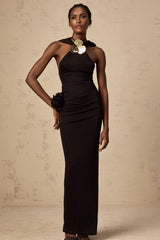 A black maxi dress with a hood featuring floral appliques named Axelle