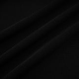 A black maxi dress with a hood featuring floral appliques named Axelle