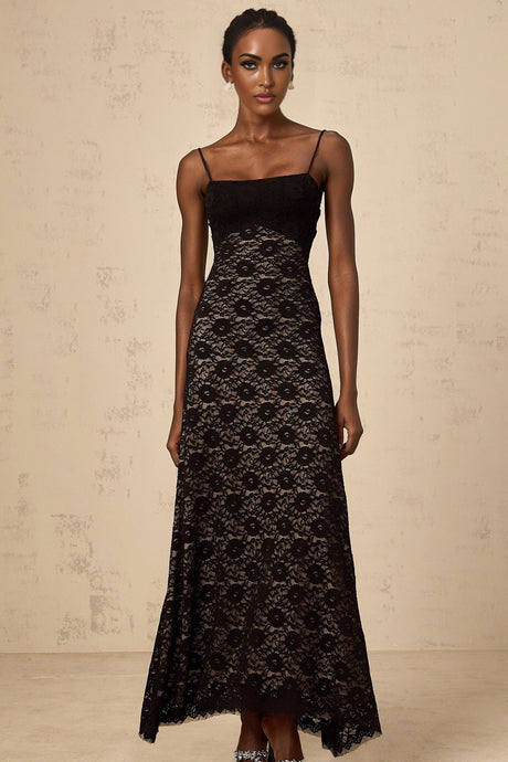 A black maxi dress with an open back featuring floral lace pattern and a long flowing silhouette