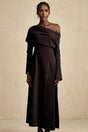 A black maxi dress with high slit and pleated design suitable for Valentines Day occasion