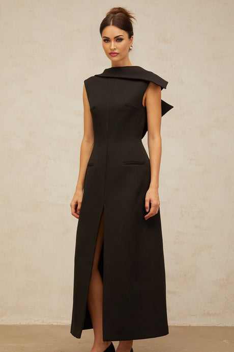 A black midi dress with an open back and deconstructed design named Leonore