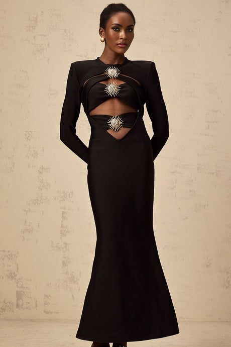 A black midi dress with cutout details featuring a sun motif design and ruched fabric Astrid style with a fitted silhouette