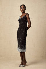 A black midi dress with faux pearl embellishments named Apolline