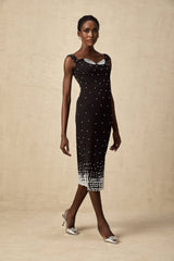 A black midi dress with faux pearl embellishments named Apolline
