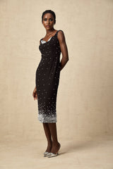 A black midi dress with faux pearl embellishments named Apolline