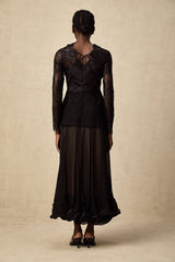 A black midi dress with floral lace panels named Amelie featuring a fitted silhouette and delicate floral patterns throughout