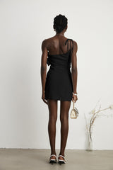 A black mini dress with a floral pattern featuring an offshoulder design and a fitted silhouette