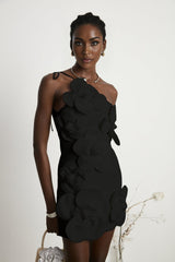 A black mini dress with a floral pattern featuring an offshoulder neckline and a fitted silhouette