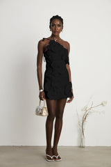 A black mini dress with a floral pattern featuring an offshoulder neckline and a short hemline