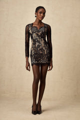 A black mini dress with delicate floral embroidery and lace details featuring a feminine silhouette and short hemline