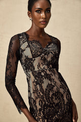 A black mini dress with delicate floral embroidery on lace fabric featuring a feminine and elegant design