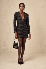 A black mini dress with embellished stripes and a fitted silhouette named Mireille
