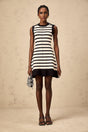 A black mini dress with horizontal stripes in a knit fabric named Heloise
