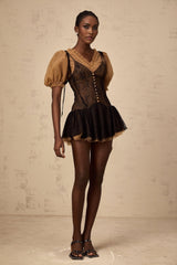 A black mini dress with lace panels featuring a feminine silhouette and delicate detailing