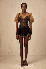 A black mini dress with lace panels featuring a fitted silhouette and delicate lace detailing throughout the bodice and sleeves