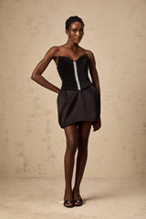 A black mini dress with ruched detailing and puff sleeves named Francis