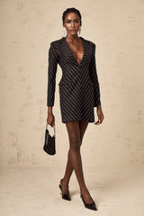 A black mini dress with striped pattern and embellishments named Mireille