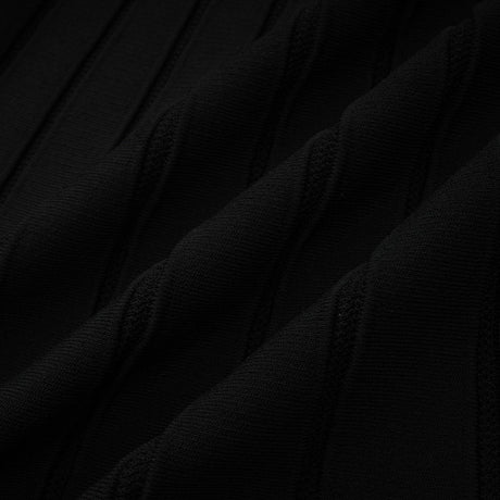 A black offshoulder mini dress with a bow detail and knit fabric featuring a fitted silhouette and short length