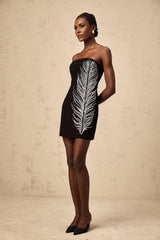 A black offshoulder mini dress with feather embellishments named Jelena
