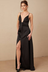 A black satin maxi dress with a V neckline and a front slit named Blanche