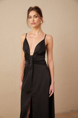 A black satin maxi dress with a V neckline and front slit named Blanche