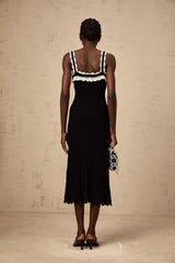 A black sleeveless midi dress with crochet knit detailing