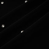 A black velvet midi dress with embellishments named Lola featuring a sleek silhouette and elegant design
