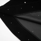 A black velvet midi dress with embellishments named Lola featuring a sleek silhouette and elegant design