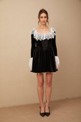 A black velvet mini dress with lace trim details named Fabiana