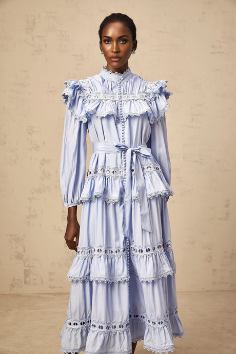 A blue tiered midi dress with lace trim details named Veronique