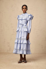 A blue tiered midi dress with lace trim details named Veronique