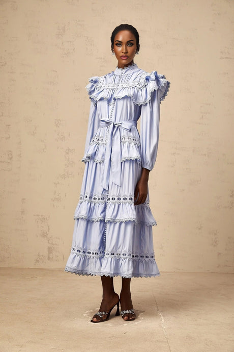 A blue tiered midi dress with lace trim details named Veronique
