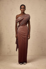 A brown maxi dress with a corsetstyle top featuring ribbon design details and a long flowing skirt