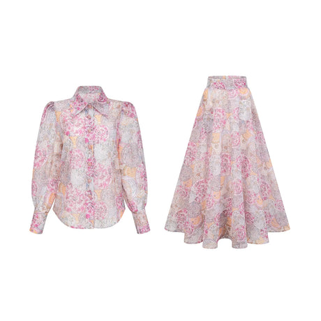 A cherry pink matching set featuring a patterned shirt and skirt with a coordinating print design