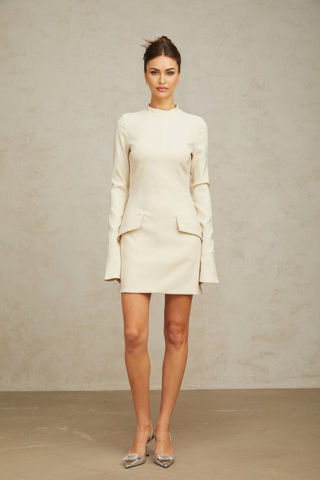 A creamwhite fitted mini dress by Chloé on a plain background